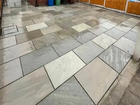 Sandstone driveway cleaned back to grey
